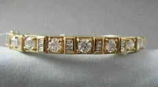 ANTIQUE WIDE 3.0CTW DIAMOND 18KT YELLOW GOLD BAGUETTE AND ROUND BANGLE