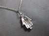SMALL .04CT DIAMOND 14KT WHITE GOLD MATTE & SHINY HAMSA CHAMSA FLOATING PENDANT