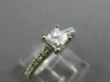 ESTATE .66CT ROUND & PRINCESS DIAMOND 14KT WHITE GOLD SOLITAIRE ENGAGEMENT RING