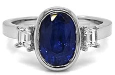 3.83CT DIAMOND & AAA SAPPHIRE 18KT WHITE GOLD 3D OVAL & EMERALD CUT 3 STONE RING