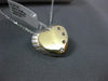 ESTATE .04CT DIAMOND 14KT TWO TONE GOLD FOUR STONE ETOILE HEART FLOATING PENDANT