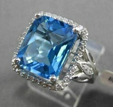 ESTATE 6.43CTW DIAMOND & AAA EXTRA FACET BLUE TOPAZ 14KT WHITE GOLD HALO RING