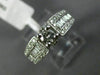 ESTATE .90CT ROUND & BAGUETTE DIAMOND 14KT WHITE GOLD FOUR PRONG ENGAGEMENT RING