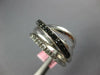 WIDE .55CT WHITE & BLACK DIAMOND 14KT WHITE GOLD MULTI ROW CRISS CROSS LOVE RING