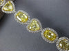 EXTRA LARGE 19.42CT WHITE & FANCY YELLOW DIAMOND 18KT WHITE GOLD TENNIS BRACELET
