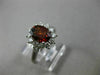 ESTATE 1.45CT DIAMOND & NATURAL GARNET 18KT WHITE GOLD OVAL HALO ENGAGEMENT RING