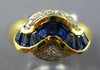 1.66CT DIAMOND & AAA SAPPHIRE 18KT YELLOW GOLD ROUND & BAGUETTE SWIRL FUN RING