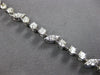3.15CT DIAMOND 14KT WHITE GOLD 3D ROUND MULTI LEAF BY THE YARD TENNIS BRACELET