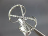 ESTATE LARGE .58CT DIAMOND 18KT WHITE GOLD 3D X LOVE RING