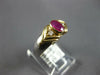 ESTATE .72CT DIAMOND & AAA RUBY 14KT YELLOW GOLD OVAL & ROUND DOUBLE V FUN RING