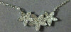 ESTATE .13CT DIAMOND 14K WHITE GOLD CLASSIC PAVE THREE STAR FLOWER LOVE NECKLACE
