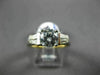 ESTATE .42CT BAGUETTE & ROUND DIAMOND & CUBIC ZIRCONIUM PLATINUM ENGAGEMENT RING