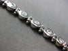 ESTATE 1CT DIAMOND 14KT WHITE GOLD 3D CLASSIC ROUND BEZEL ETOILE TENNIS BRACELET
