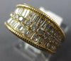 LARGE 1.0CT DIAMOND 14KT YELLOW GOLD 3D ROUND & BAGUETTE 3 ROW ANNIVERSARY RING