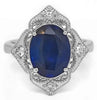 LARGE 4.06CT DIAMOND & AAA SAPPHIRE 18KT WHITE GOLD OVAL & ROUND ENGAGEMENT RING