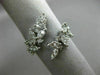 ESTATE WIDE 18KT WHITE GOLD LOVE RING. 3D MULTI LEAF CRISS CROSS DESIGN