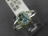 ESTATE .48CT DIAMOND & AAA OVAL CUT AQUAMARINE 14KT WHITE GOLD 3D LOVE KNOT RING