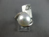 LARGE .48CT DIAMOND & AAA SOUTH SEA PEARL 18KT WHITE GOLD CRISS CROSS SWIRL RING