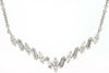 ESTATE .34CT DIAMOND 14KT WHITE GOLD 3D ROUND & BAGUETTE V SHAPE LOVE NECKLACE