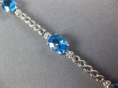 8.14CT DIAMOND & AAA BLUE TOPAZ 14KT WHITE GOLD 3D OVAL & ROUND TENNIS BRACELET