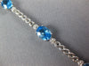 8.14CT DIAMOND & AAA BLUE TOPAZ 14KT WHITE GOLD 3D OVAL & ROUND TENNIS BRACELET