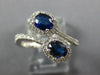WIDE 1.23CT DIAMOND & AAA SAPPHIRE 18KT WHITE GOLD OVAL & ROUND CRISS CROSS RING
