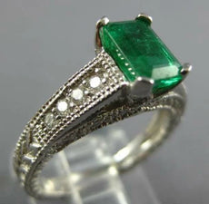1.45CT DIAMOND & AAA EMERALD 14KT WHITE GOLD EMERALD CUT & ROUND ENGAGEMENT RING