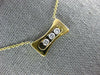 ESTATE .17CT DIAMOND 18KT 2 TONE GOLD 3D 3 STONE ETOILE FLOATING LOVE PENDANT