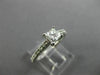 ESTATE .66CT ROUND & PRINCESS DIAMOND 14KT WHITE GOLD SOLITAIRE ENGAGEMENT RING