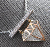 ESTATE LARGE .52CT DIAMOND 14KT WHITE & ROSE GOLD DIAMOND DISTRICT LOGO NECKLACE