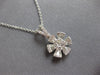 ESTATE .63CT DIAMOND 14KT WHITE GOLD 3D ROUND & BAGUETTE FLOWER FLOATING PENDANT