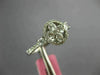 ESTATE .86CT DIAMOND 18KT WHITE GOLD 3D ROUND & PRINCESS FLOWER HALO LOVE RING