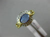 ESTATE .92CT DIAMOND & AAA OVAL TANZANITE 14KT YELLOW GOLD SEMI BEZEL LOVE RING