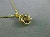 ESTATE SMALL .03CT DIAMOND 14KT YELLOW GOLD 3D FLOATING LOVE KNOT PENDANT #25417
