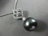 ESTATE .50CT DIAMOND & AAA TAHITIAN PEARL 18KT WHITE GOLD FLOATING HEART PENDANT