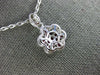 ESTATE 1.07CT DIAMOND & AAA RUBY 18KT WHITE GOLD CLASSIC CLUSTER FLOWER PENDANT