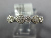 ESTATE .59CT DIAMOND 18KT WHITE GOLD 3D HEART SHAPE ETERNITY ANNIVERSARY RING