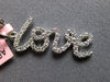 ESTATE .16CT DIAMOND 14KT WHITE GOLD 3D SCRIPT LOVE FLOATING PENDANT