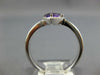 .70CT DIAMOND & AAA AMETHYST 14KT WHITE GOLD TRILLION & ROUND CRISS CROSS RING