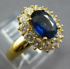 1.97CT DIAMOND & SAPPHIRE 18KT YELLOW GOLD OVAL & ROUND FLOWER ENGAGEMENT RING