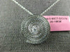 ESTATE .83CT DIAMONDS 18KT WHITE GOLD CIRCULAR MULTI ROW SWIRL SOLITAIRE PENDANT