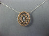 ESTATE .41CT DIAMOND 14KT WHITE AND ROSE GOLD 3D OVAL BY THE YARD LOVE PENDANT