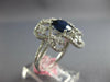 2.92CT DIAMOND & AAA SAPPHIRE 18KT WHITE GOLD 3D OVAL & ROUND FLOWER LOVE RING