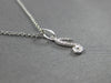 ESTATE .06CT DIAMOND 14KT WHITE GOLD CLASSIC MUSICAL NOTE FUN FLOATING PENDANT