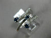 ESTATE WIDE .83CT DIAMOND & AAA SAPPHIRE 18K WHITE GOLD CRISS CROSS ETOILE RING