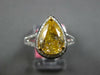 LARGE 2.68CT WHITE & FANCY YELLOW DIAMOND 18KT 2 TONE GOLD HALO ENGAGEMENT RING