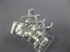 ESTATE LARGE .69CT DIAMOND 18KT WHITE GOLD 3D MULTI ROW INFINITY LOVE RING