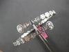 LARGE 5.69CT DIAMOND 18KT WHITE GOLD ROUND & BAGUETTE INVISIBLE BANGLE BRACELET