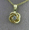 ESTATE SMALL .03CT DIAMOND 14KT YELLOW GOLD 3D FLOATING LOVE KNOT PENDANT #25417
