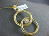 ESTATE LARGE .19CT DIAMOND 18K YELLOW GOLD FLOWER CIRCULAR LOVE KNOT FUN PENDANT